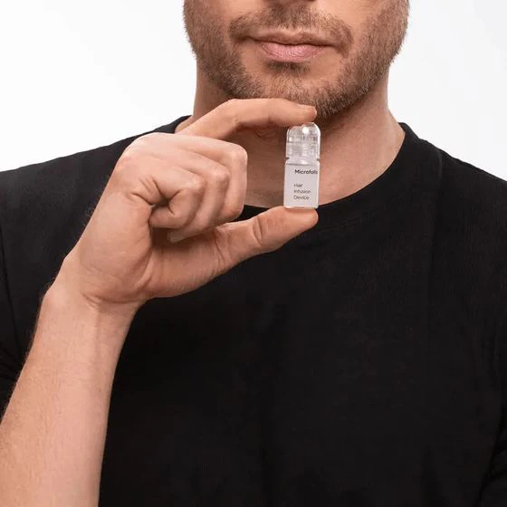 Opening a fresh single-use serum vial